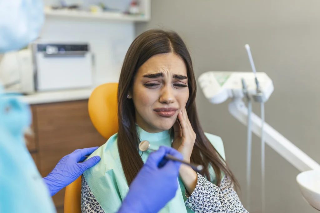 aching patient needing root canal treatment