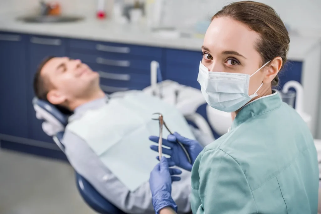 dentist-waxhaw-nc-caring-dental-team-with-patient
